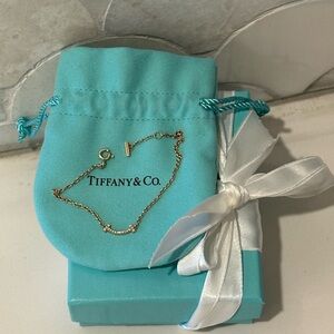 Tiffany & Co. T Smile 18K Rose Gold Chain Bracelet with diamonds.